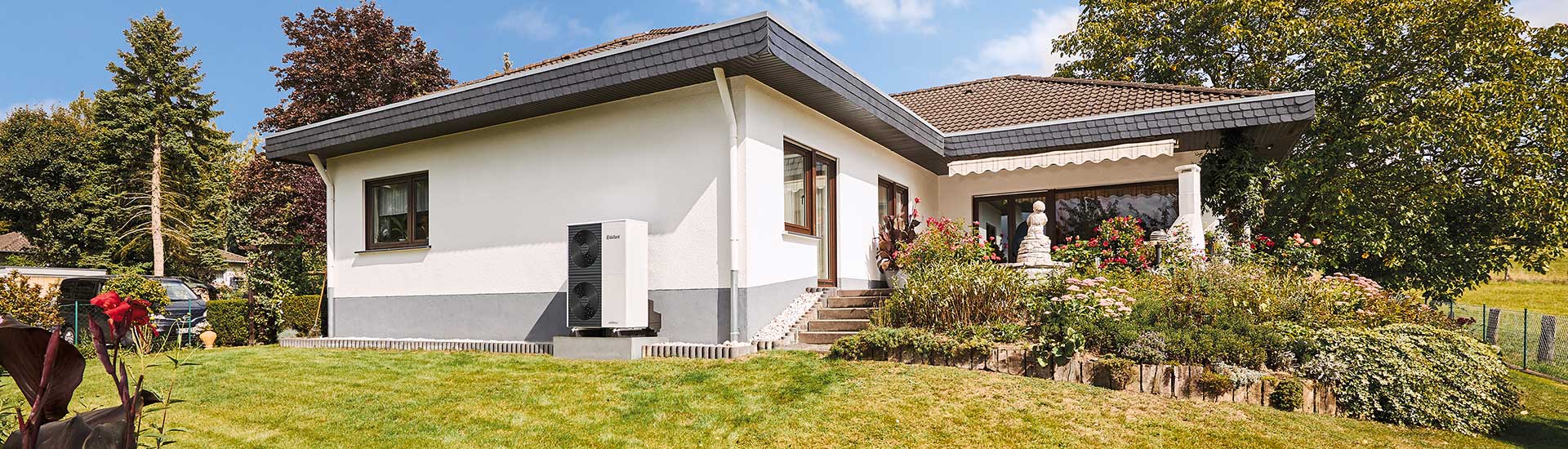 white-painted-bungalow-with-vailliant-heat-pump